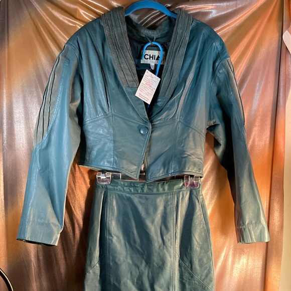 Vintage 80’s teal leather skirt suit. Classic hug shoulders waist detail size‎ M